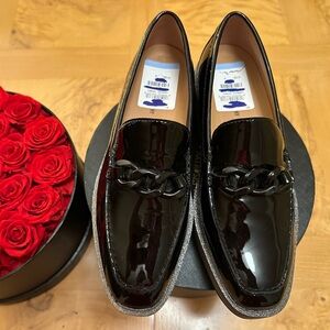 Johnston & Murphy Gracelyn Black Patent Leather chain Loafers.